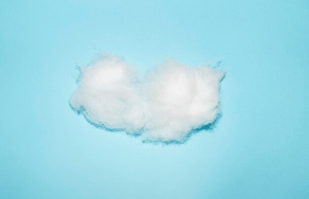 Photo close-up of cotton on blue background