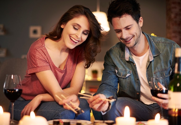 Close up of couple having japanese food