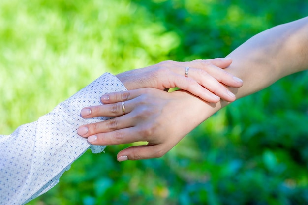 Close up of couple hold hands talking sharing secrets showing
love and care husband and wife have tender close moment together
demonstrate support and understandingworld peace concept