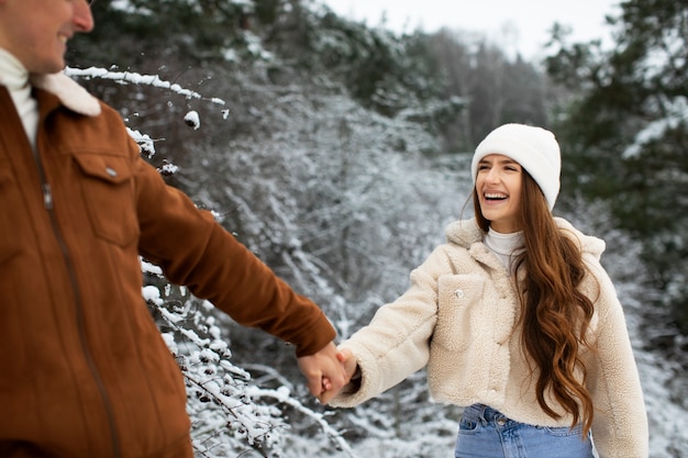 Close up couple holding hands