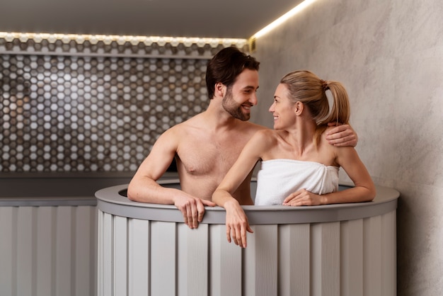 Photo close up on couple relaxing in the sauna