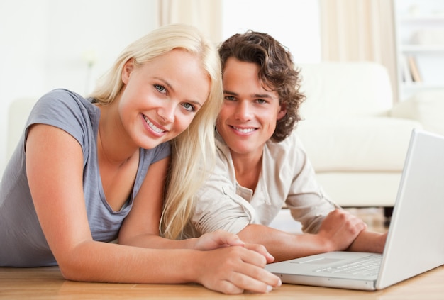 Close up of a couple with a laptop