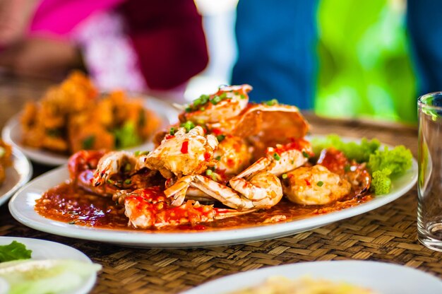 Close-up of crab gravy served on table