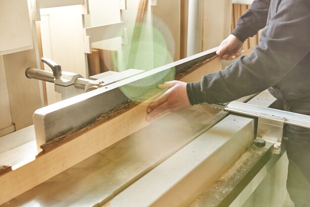 Close up of craftsman working at his workstation