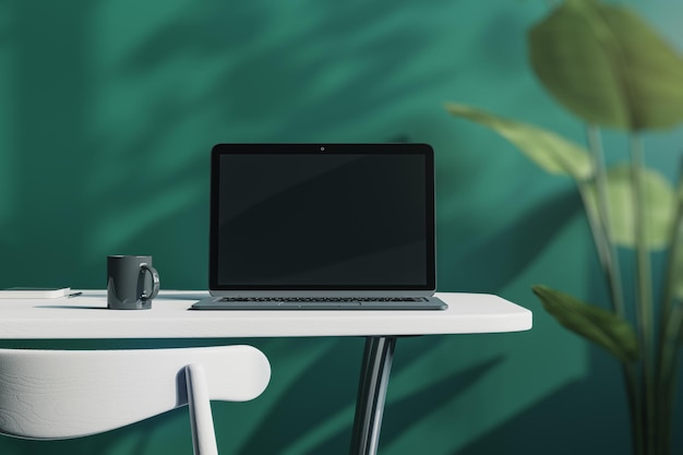 Close up of creative designer office desktop with empty laptop\
screen with mock up place in frame green wall background with\
sunlight and shadows blurry decorative plant and coffee cup 3d\
rendering