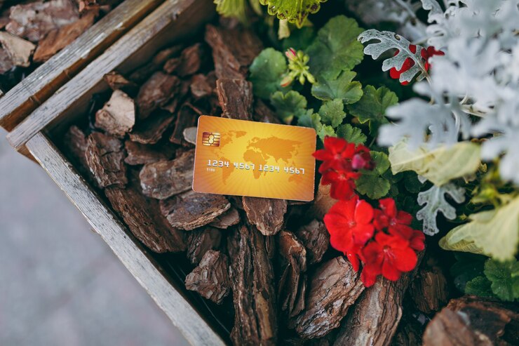 Photo close up credit bank yellow card on pieces of wood