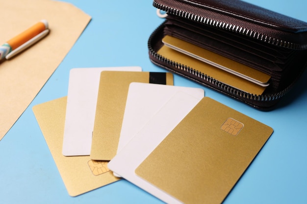 Close up of credit cards in a wallet on wooden background