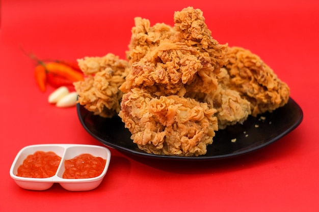 Close up of crispy and tasty fried chicken