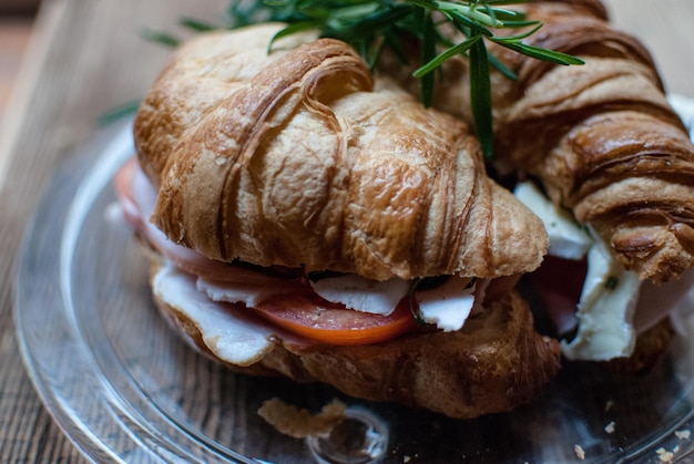 Close-up of croissant in plate on table