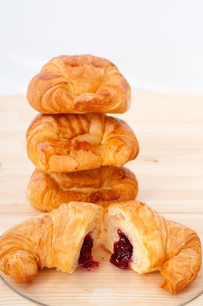 close-up of croissant served on table
