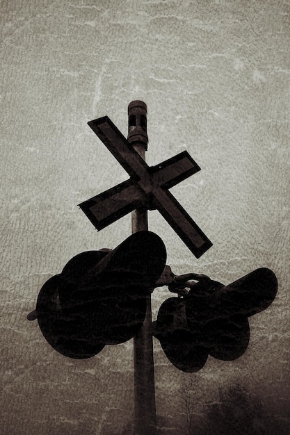 Close-up of cross on wall