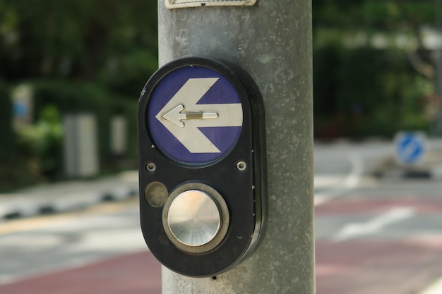 Close up of crossing signal button in singapore