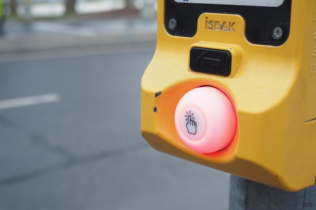 Photo close up of crossing signal button