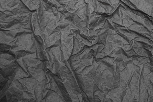 Close up crumpled creased paper old texture background for design