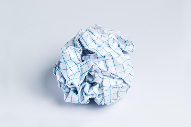 Photo close-up of crumpled paper against white background