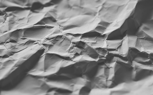 A close up of a crumpled paper with the word " on it "