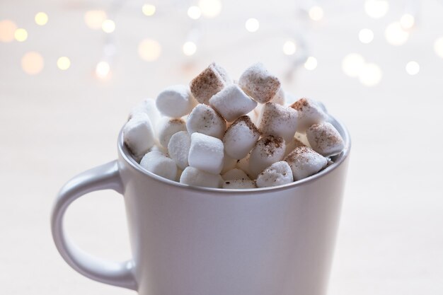 Close up cup of hot cocoa with marshmallows