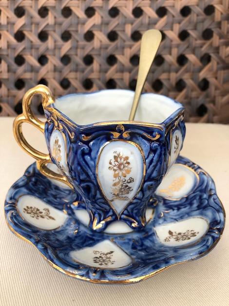 Close-up of cup and saucer on table