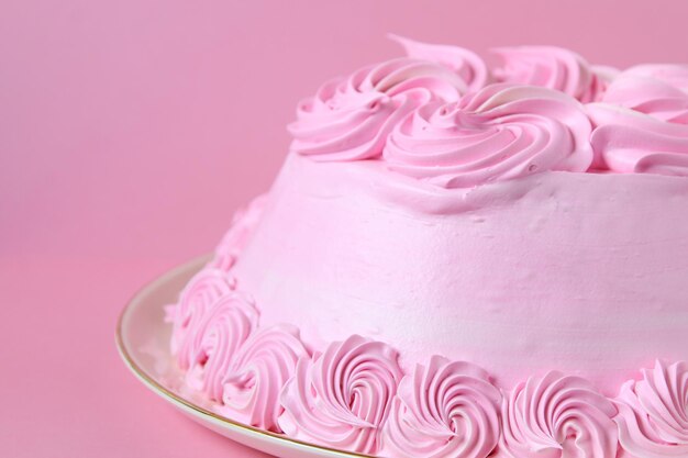 Close-up of cupcakes against pink background