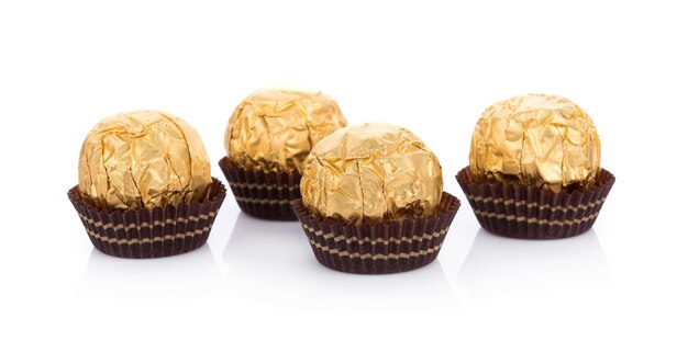 Photo close-up of cupcakes against white background