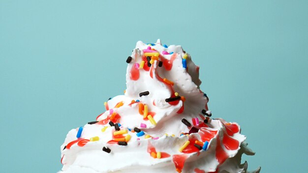 Photo close-up of cupcakes against white background