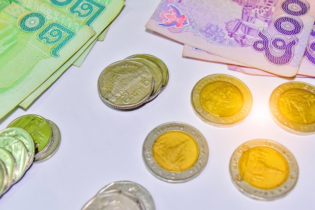 Photo close-up of currencies on white background