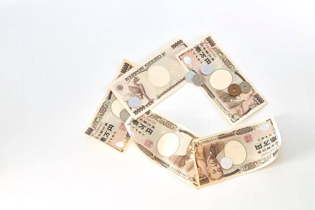 Photo close-up of currency over white background