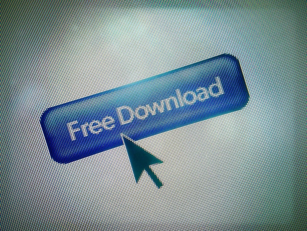 Close-up of cursor on free download icon