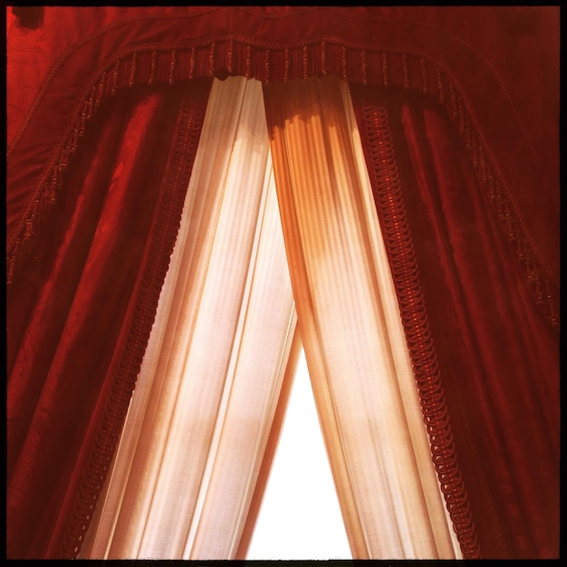 Close-up of curtained window