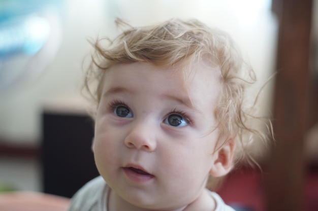 close-up of cute baby boy at home
