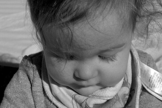 Photo close-up of cute baby girl