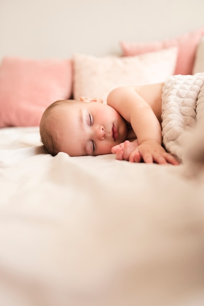 Photo close up of cute baby sleeping