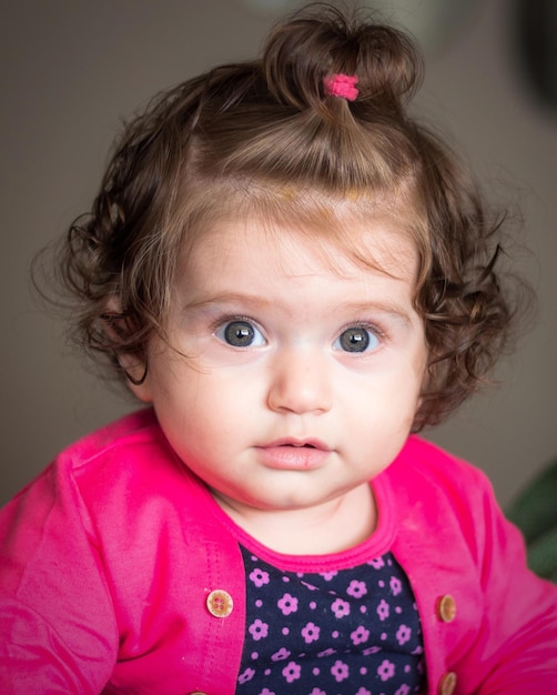 Photo close-up of cute girl at home