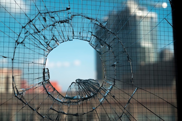 Close-up of damaged building against sky