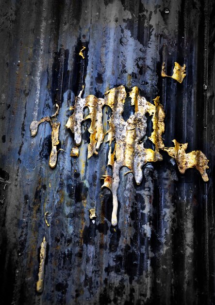Photo close-up of damaged corrugated iron