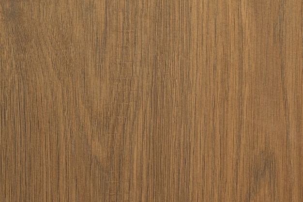 Photo close-up of dark brown laminate floor covering