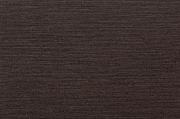 Close up of dark brown paper texture background