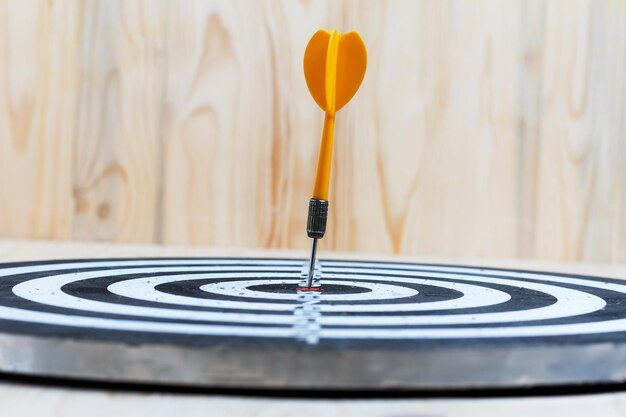 Close-up of dart on dartboard