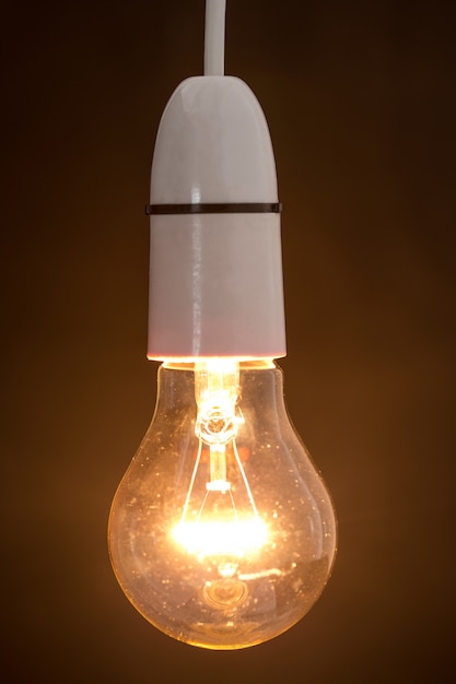 Photo close up of dazzling light bulb