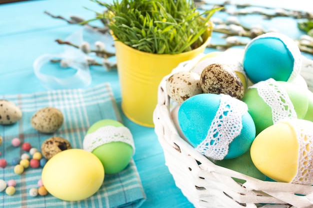 Close-up of decorated easter eggs on a blue table