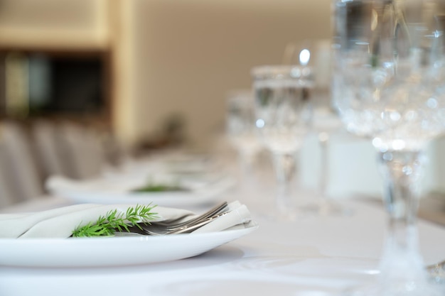 Close up to decoration on the luxury dinner table in warm light and cozy mood and tone