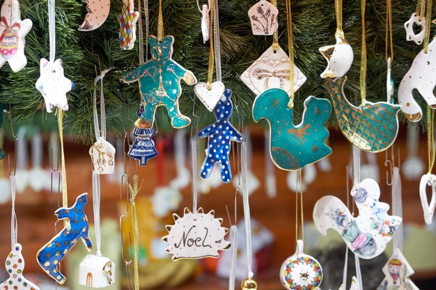 Photo close-up of decorations hanging for sale