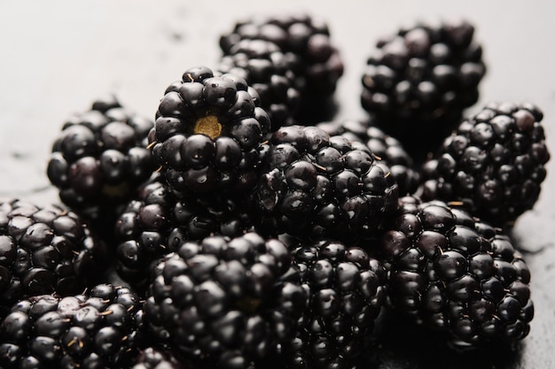 Close-up of delicious fresh blackberries with water drops.