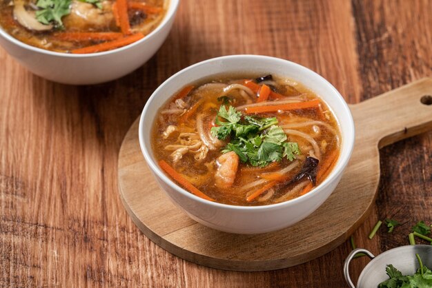 Close up of delicious traditional thick soup with shrimp meat ball and vegetables in Taiwan.