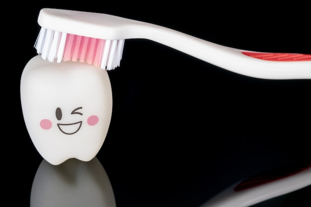 Close up; Dental tools and smile teeth model