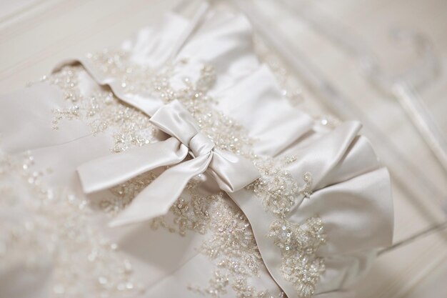 Photo close-up of designs on wedding dress