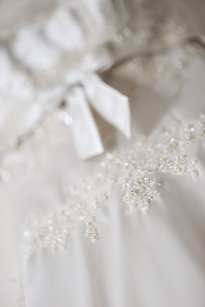 Photo close-up of designs on wedding dress