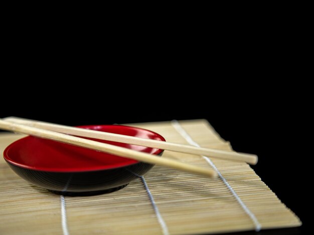 Photo close-up of dessert on table against black background