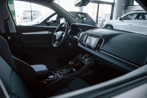 Close up detailed view of interior of brand new modern car.