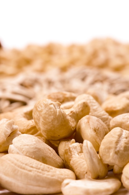 Close up details on cashew nuts isolated